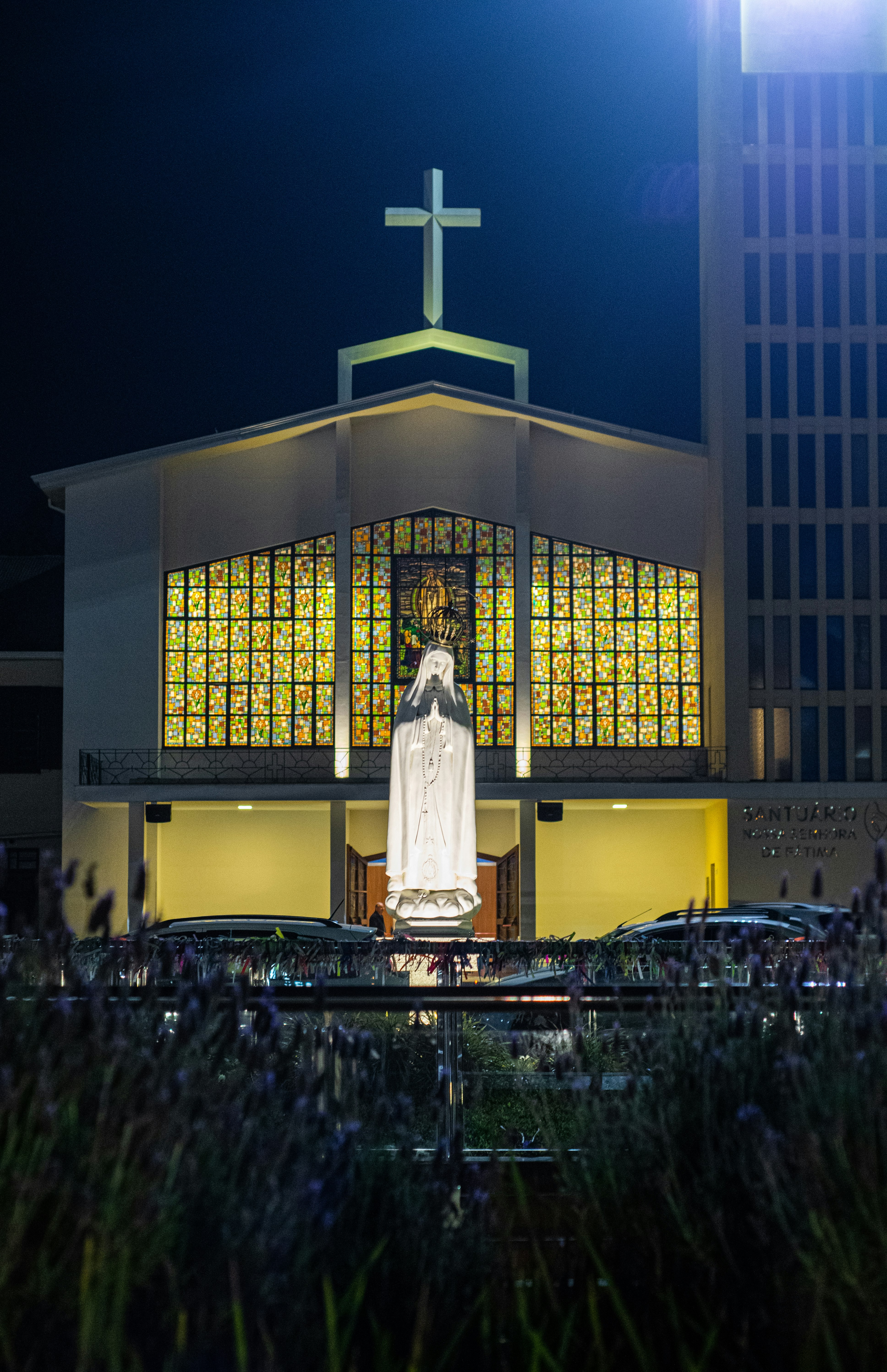 lighted cathedral with cross